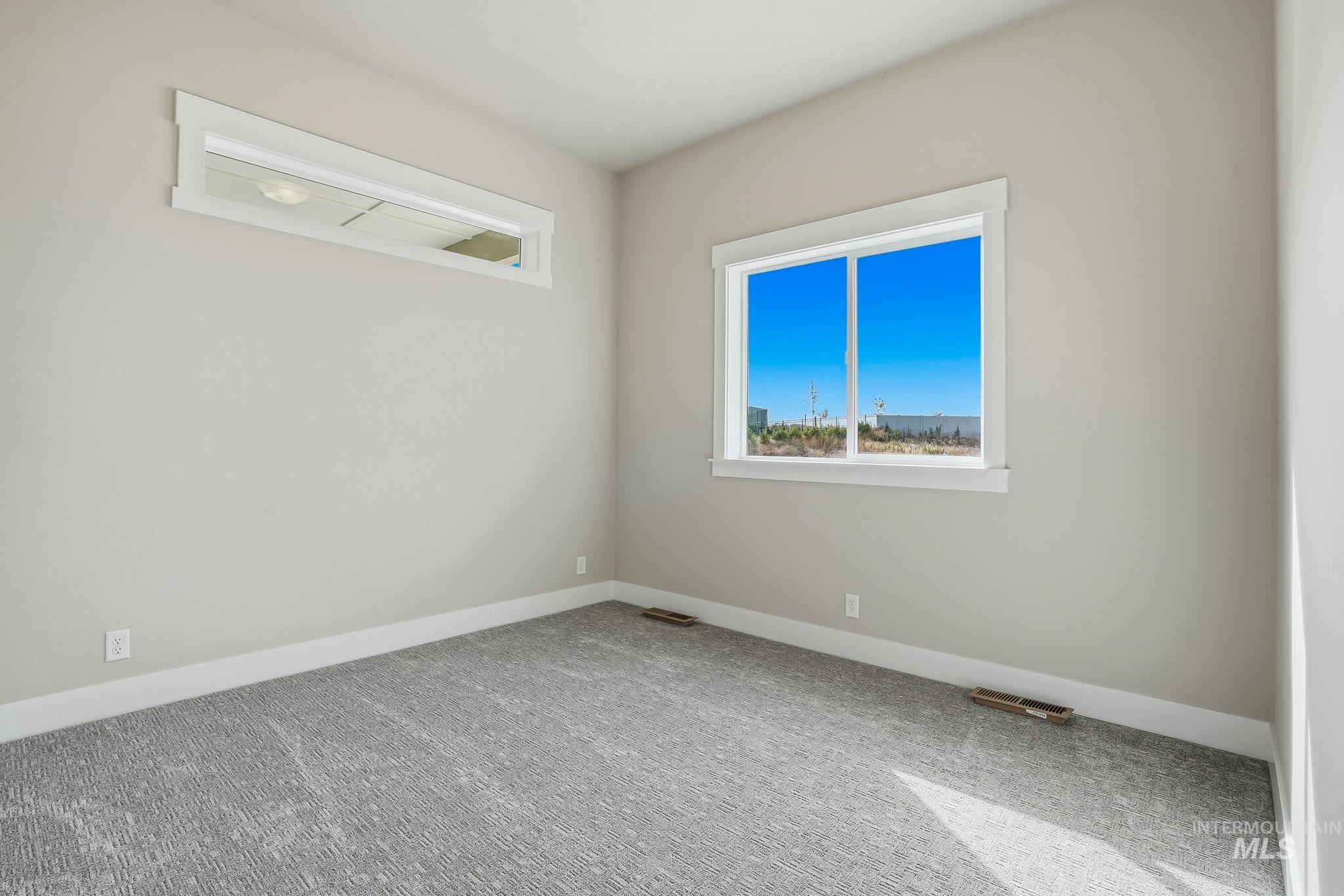 470 South Radiator Way Boise, ID 83716 - Photo 36 of 50 Neutral wall color with white baseboards and window trim