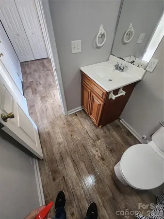 a bathroom with a sink and mirror