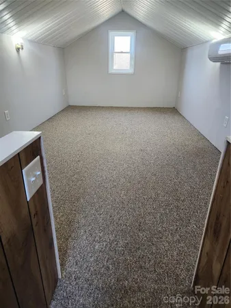 en empty room with windows