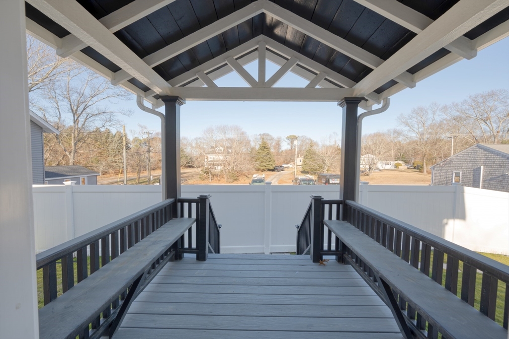 665 State Road, Unit 1 Plymouth, MA 02360 - Photo 4 of 13 a view of a city from a balcony