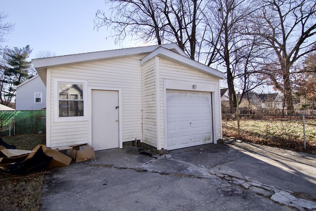 57 Bevier Street Springfield, MA 01107 - Photo 3 of 22 a view of a house with a yard