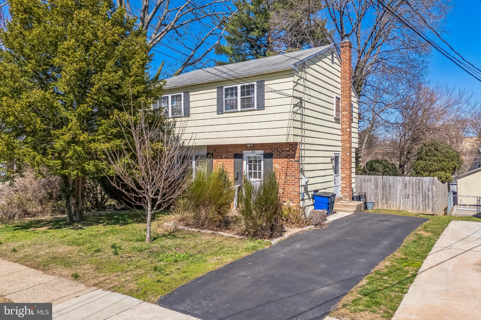 315 Shaw Road Ridley Park, PA 19078 - Photo 1 of 50 a view of a house with backyard and trees