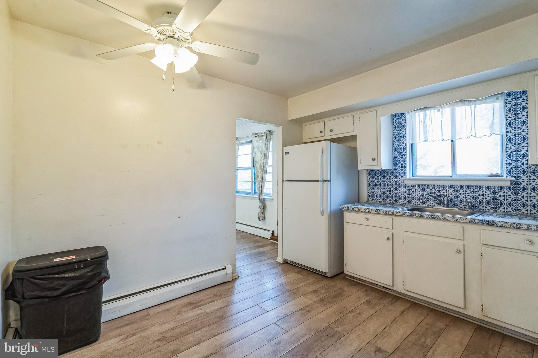 315 Shaw Road Ridley Park, PA 19078 - Photo 14 of 50 a kitchen with a refrigerator and a sink