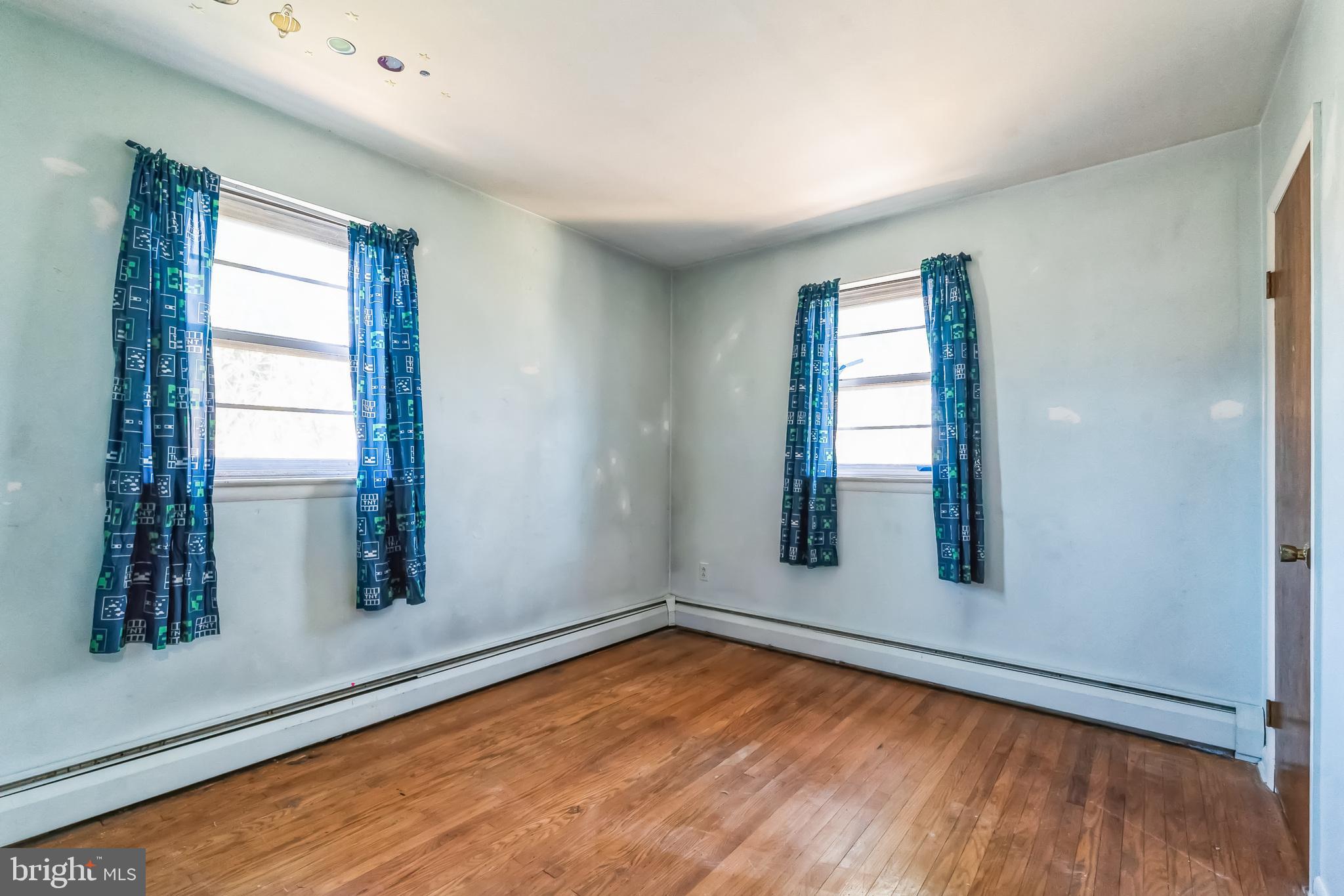 315 Shaw Road Ridley Park, PA 19078 - Photo 22 of 50 an empty room with windows