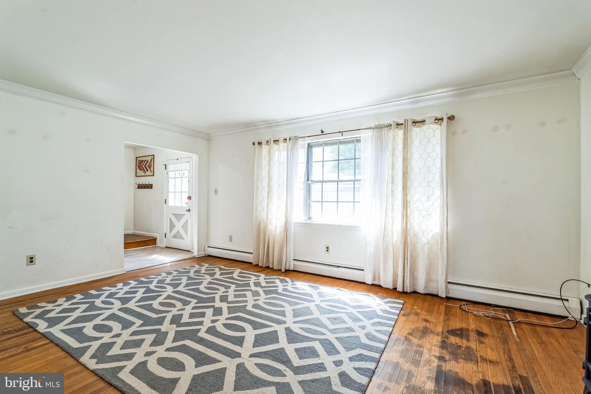 315 Shaw Road Ridley Park, PA 19078 - Photo 5 of 50 a view of a room with an empty room and window