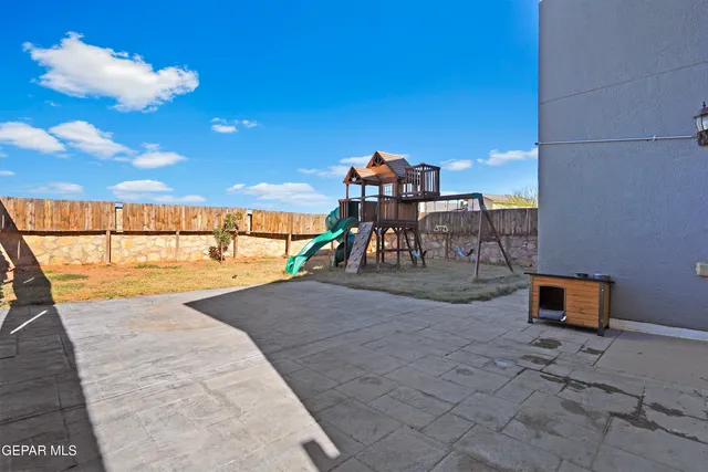 a view of a house with snow on the ground