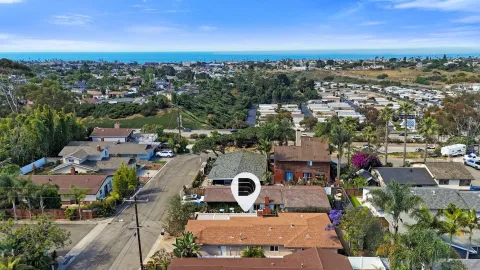 an aerial view of a house with a outdoor space