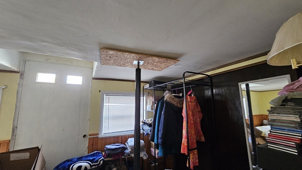 71 Russell Street Hadley, MA 01035 - Photo 19 of 32 a view of walk in closet with clothes and shoes