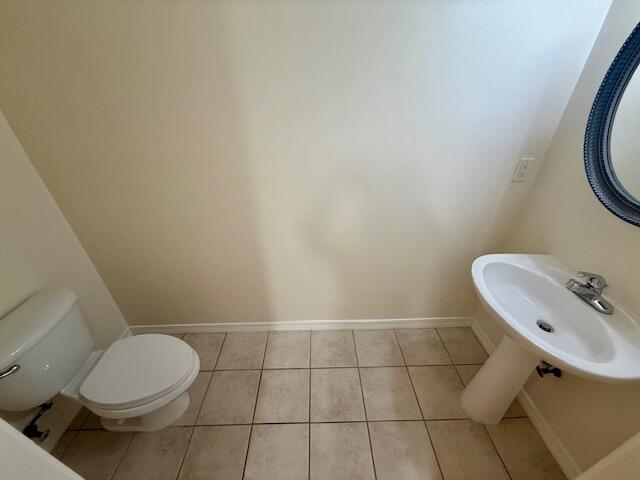 223 Johnson Court, Unit 223 Crestview, FL 32536 - Photo 5 of 16 a bathroom with a toilet and a sink