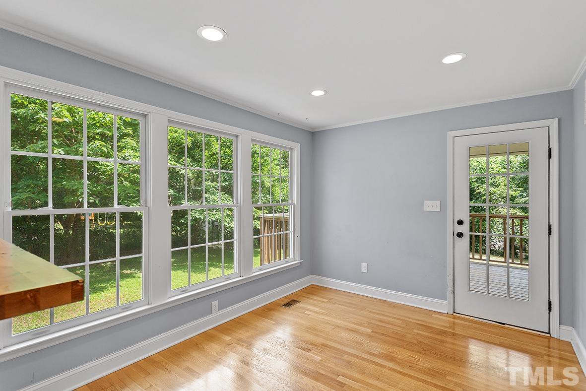 2727 Layden Street Raleigh, NC 27603 - Photo 16 of 23 a view of empty room with wooden floor and fan
