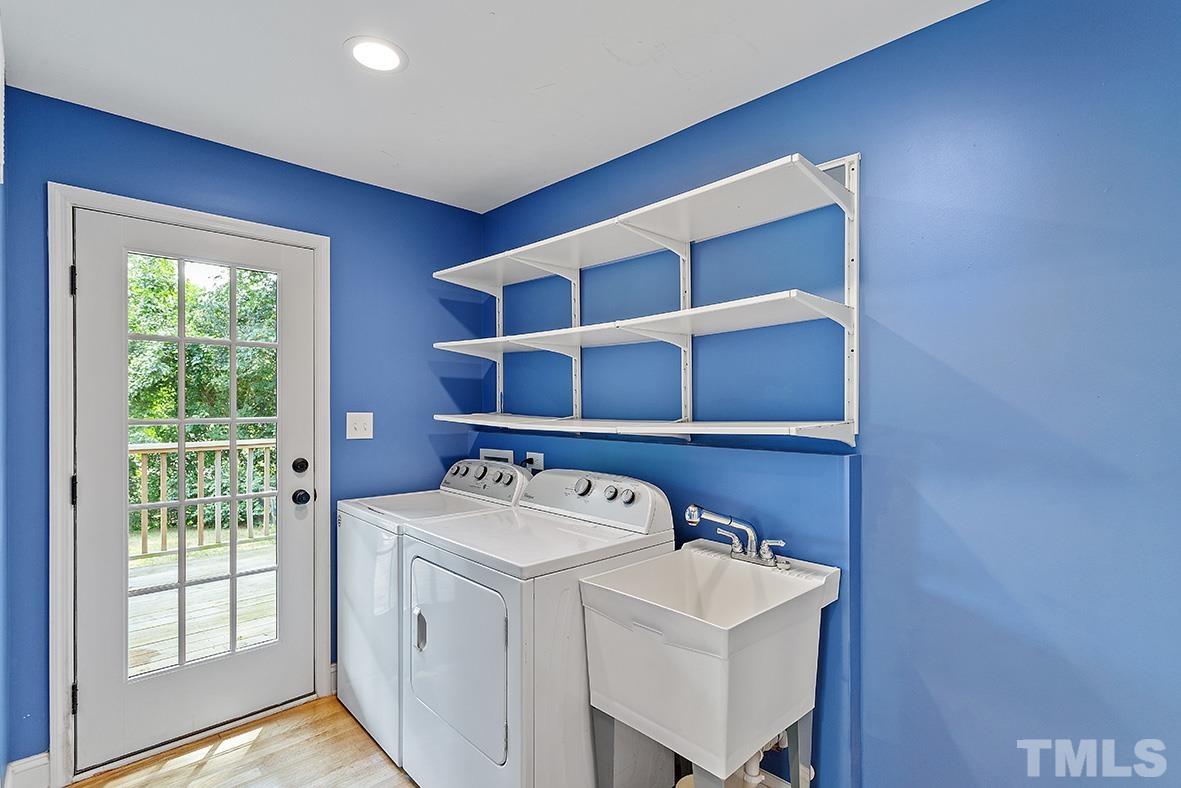2727 Layden Street Raleigh, NC 27603 - Photo 18 of 23 a utility room with dryer and washer