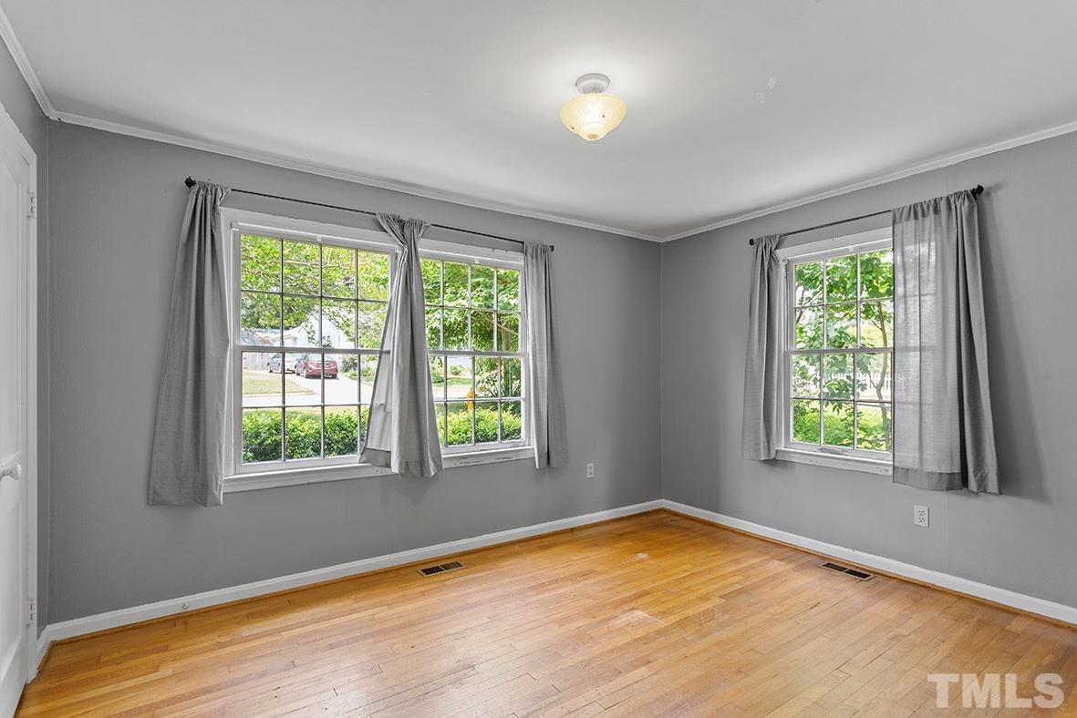 2727 Layden Street Raleigh, NC 27603 - Photo 19 of 23 a view of an empty room with a window