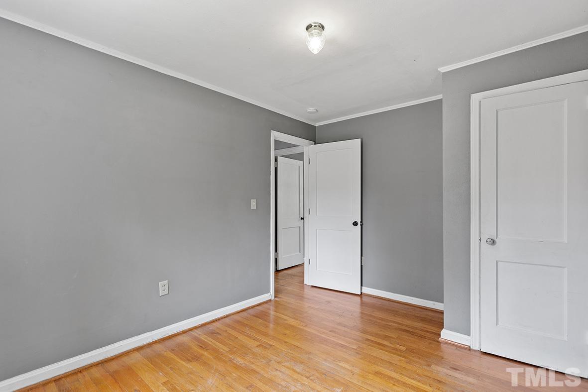 2727 Layden Street Raleigh, NC 27603 - Photo 22 of 23 a view of an empty room with wooden floor