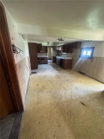 a view of a livingroom with furniture and window