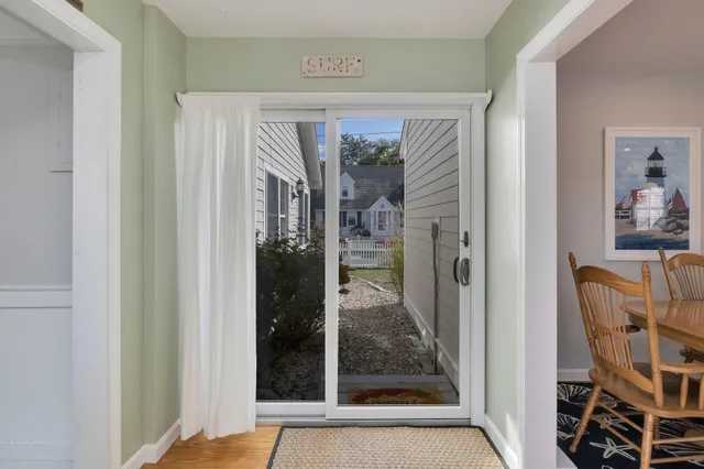 a kitchen with a refrigerator and a sink