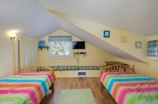 a bathroom with a sink toilet and a mirror