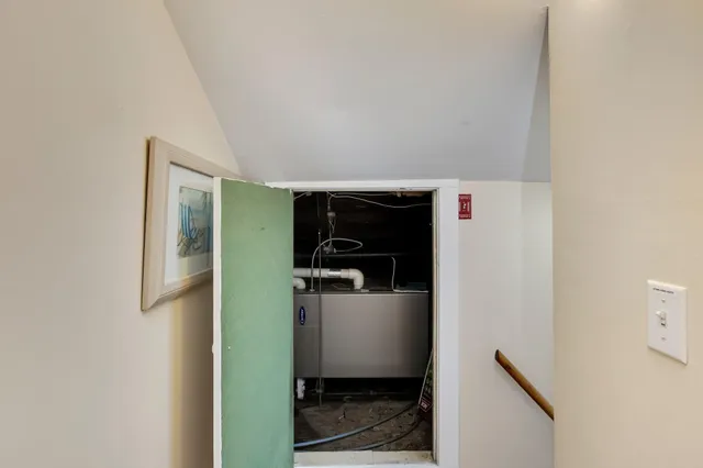 a picture of a bench in front of a window