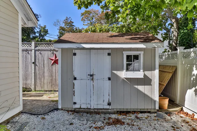 a view of a swimming pool and lounge chairs