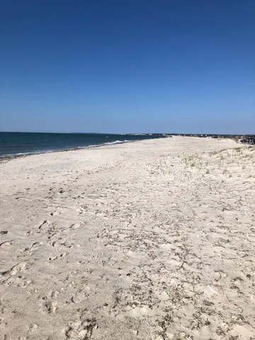 a front view of house with deck