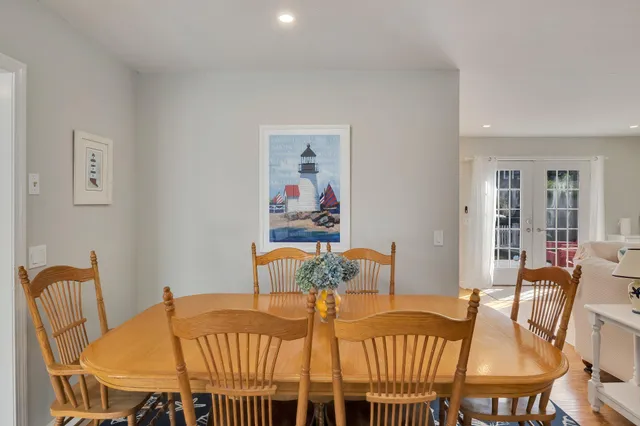 a bedroom with a bed and a window with outer view
