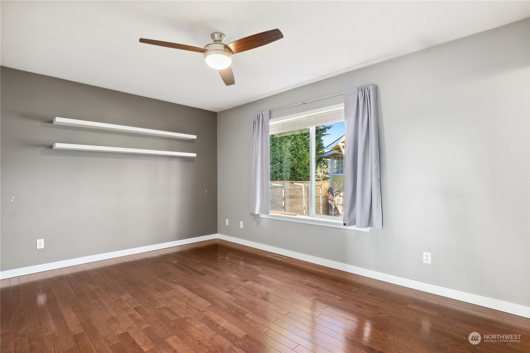 2028 Northeast 12th Street Renton, WA 98056 - Photo 11 of 40 an empty room with a window