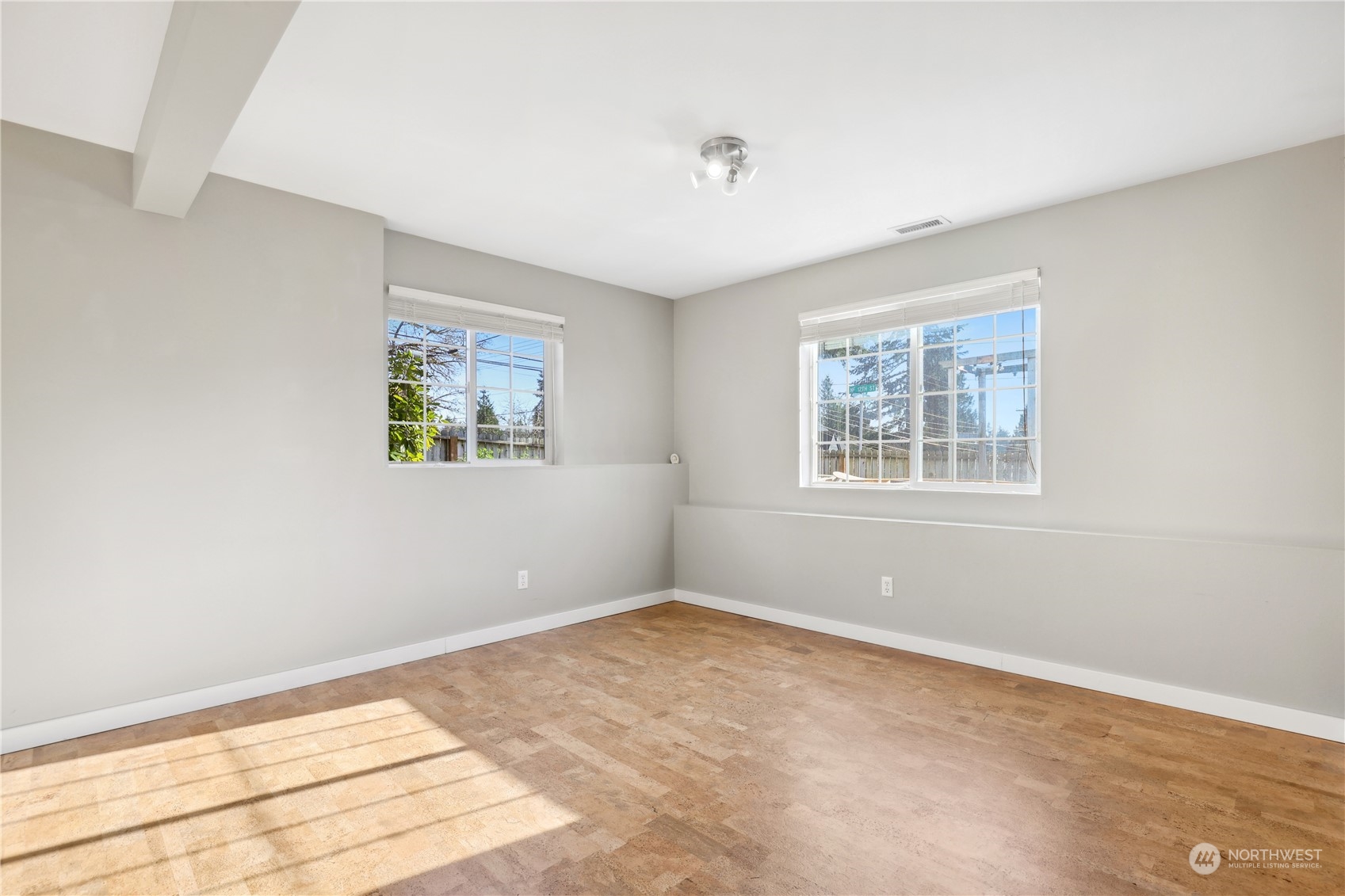 2028 Northeast 12th Street Renton, WA 98056 - Photo 19 of 40 a view of an empty room with a window