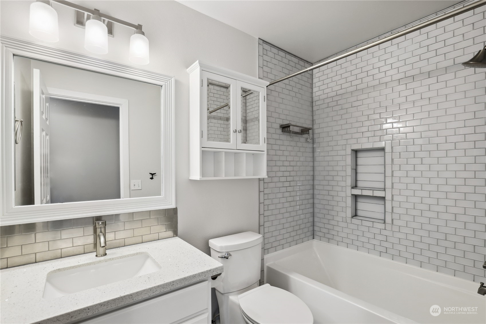 2028 Northeast 12th Street Renton, WA 98056 - Photo 23 of 40 a bathroom with a sink toilet and shower