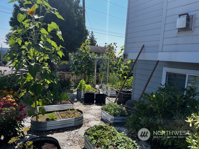 2028 Northeast 12th Street Renton, WA 98056 - Photo 35 of 40 a backyard of a house with lots of green space