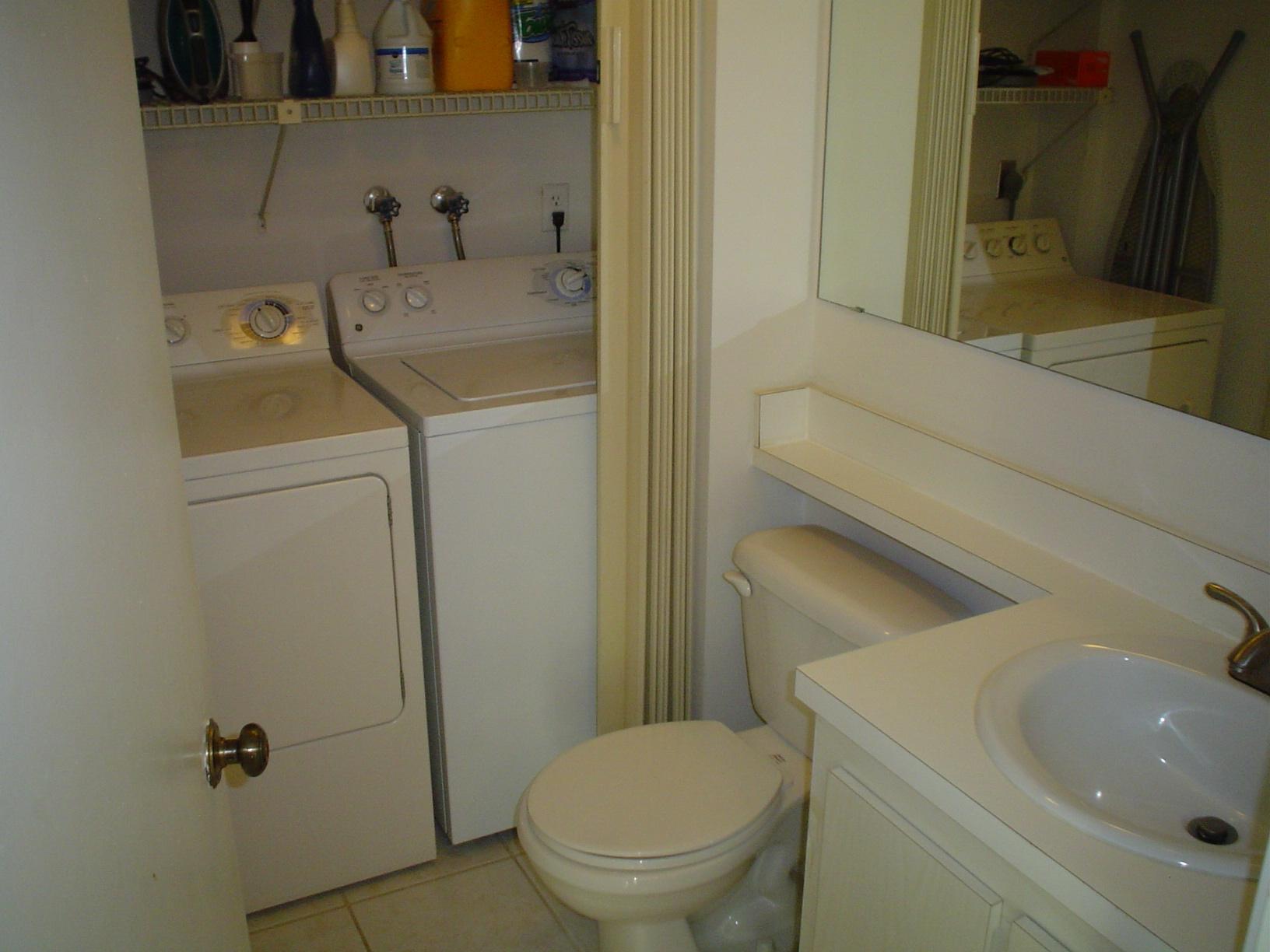 1445 Masters Circle, Unit 157 Delray Beach, FL 33445 - Photo 12 of 23 a bathroom with a sink and toilet