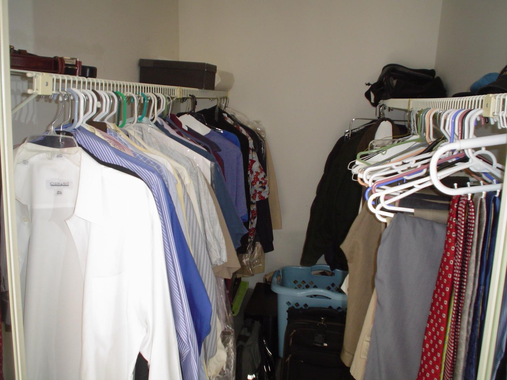 1445 Masters Circle, Unit 157 Delray Beach, FL 33445 - Photo 20 of 23 a view of walk in closet with clothes