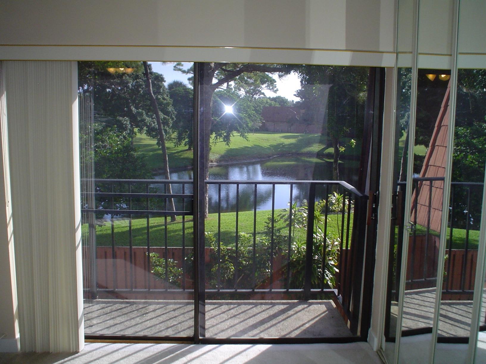 1445 Masters Circle, Unit 157 Delray Beach, FL 33445 - Photo 23 of 23 a view of backyard with green space