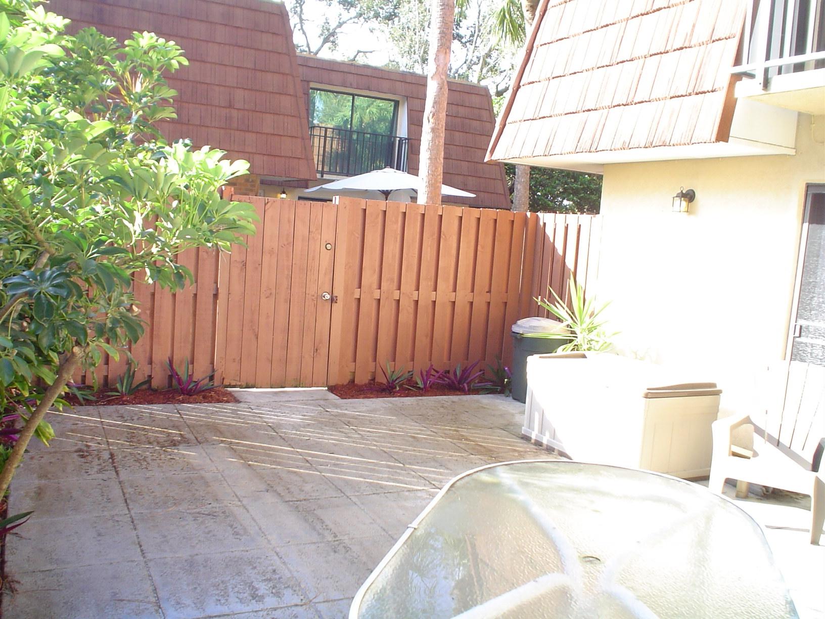 1445 Masters Circle, Unit 157 Delray Beach, FL 33445 - Photo 5 of 23 a view of outdoor space and yard