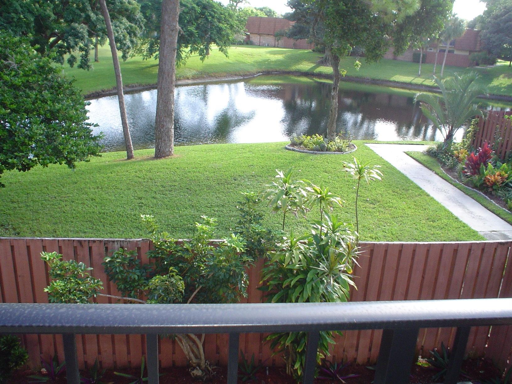 1445 Masters Circle, Unit 157 Delray Beach, FL 33445 - Photo 6 of 23 a view of lake from a roof deck