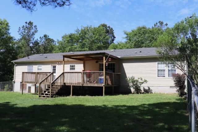 213 Browns Crossing Road Northwest Haddock, GA 31033 - Photo 26 of 28 a view of a back yard of the house