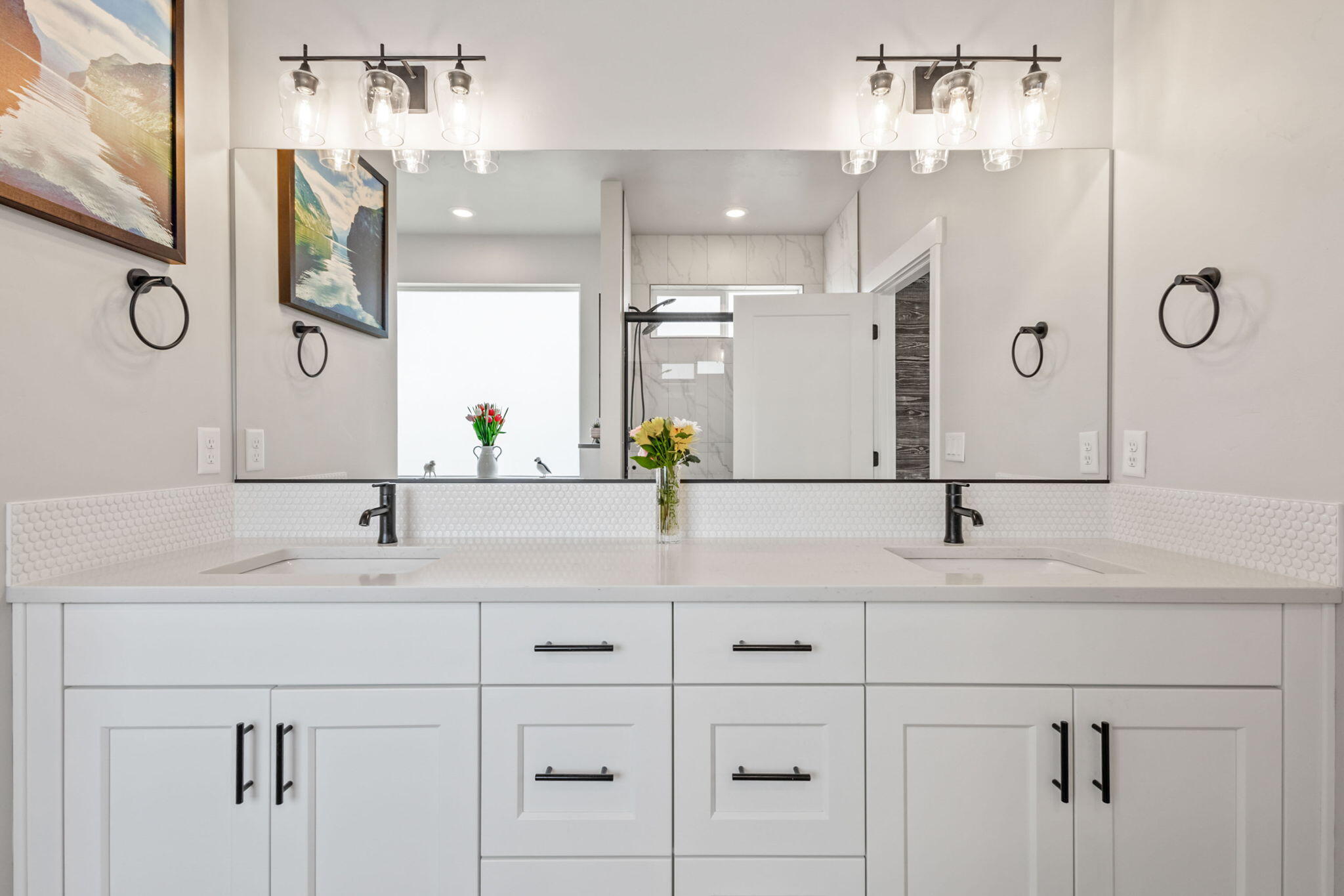 3827 Northeast Oakside Loop Bend, OR 97701 - Photo 17 of 50 a bathroom with a double vanity sink and a mirror