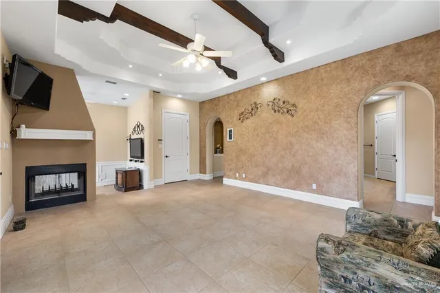 a view of a livingroom with furniture and a fireplace