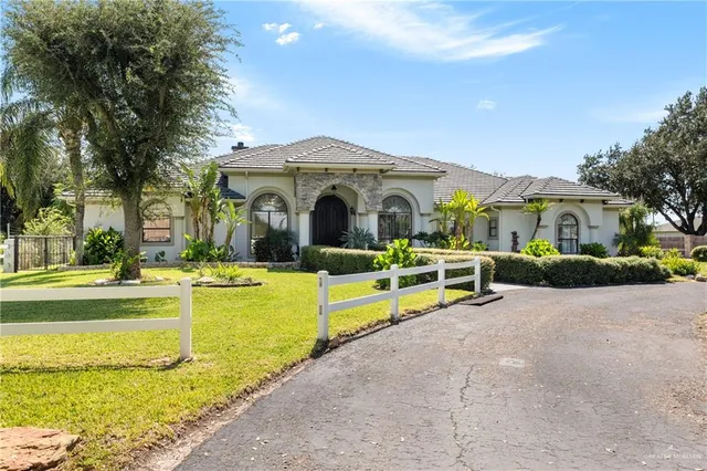 a view of a house with a swimming pool