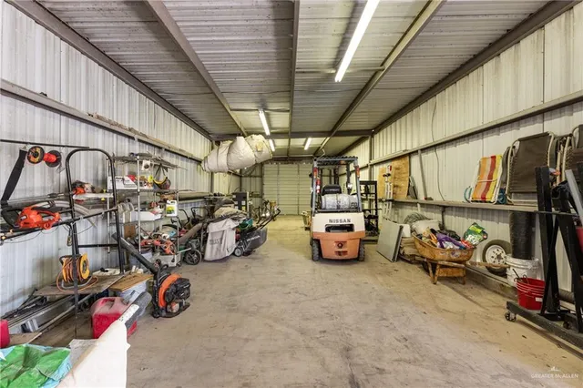 a view of parking garage with cars