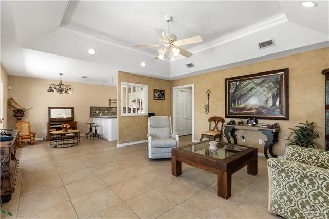 a living room with furniture and window