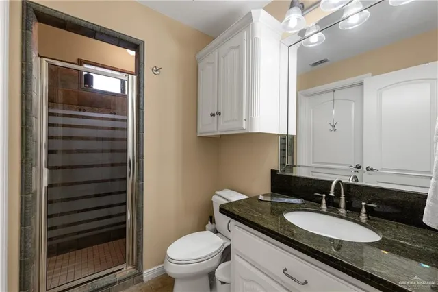 a view of a livingroom with furniture and a chandelier