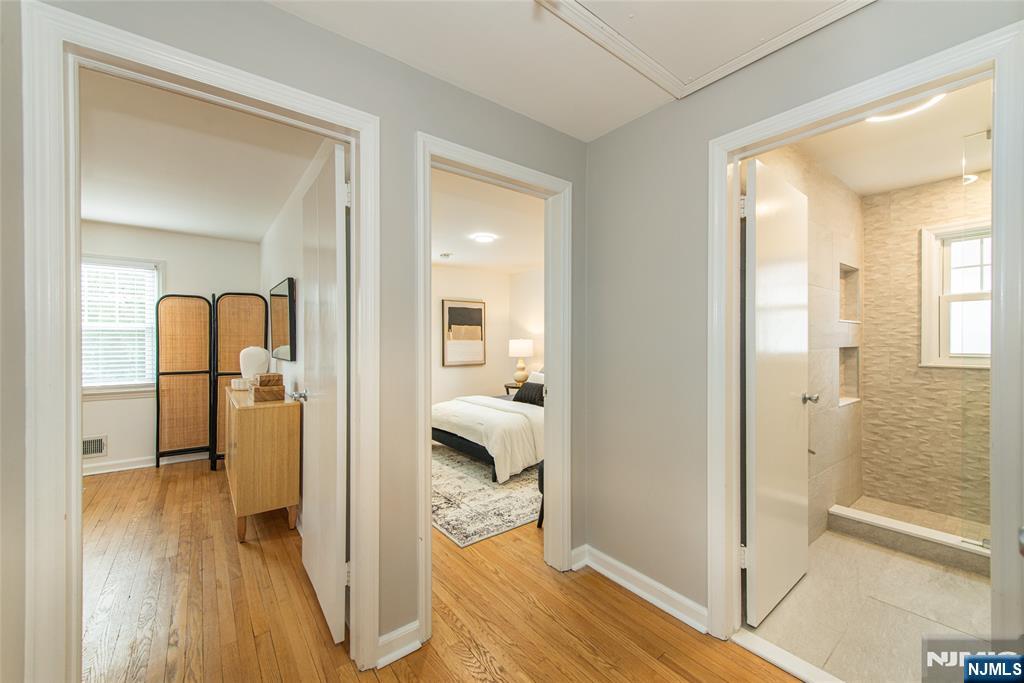 408 Washington Avenue Montclair, NJ 07042 - Photo 17 of 42 a view of a bathroom with a tub and mirror