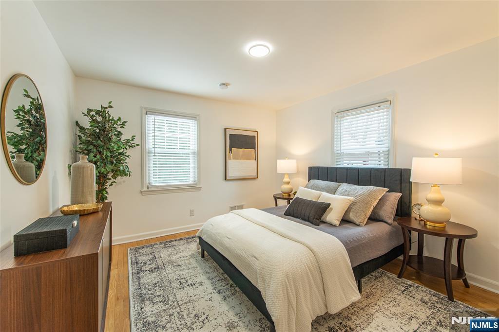 408 Washington Avenue Montclair, NJ 07042 - Photo 24 of 42 a bedroom with double bed and a window