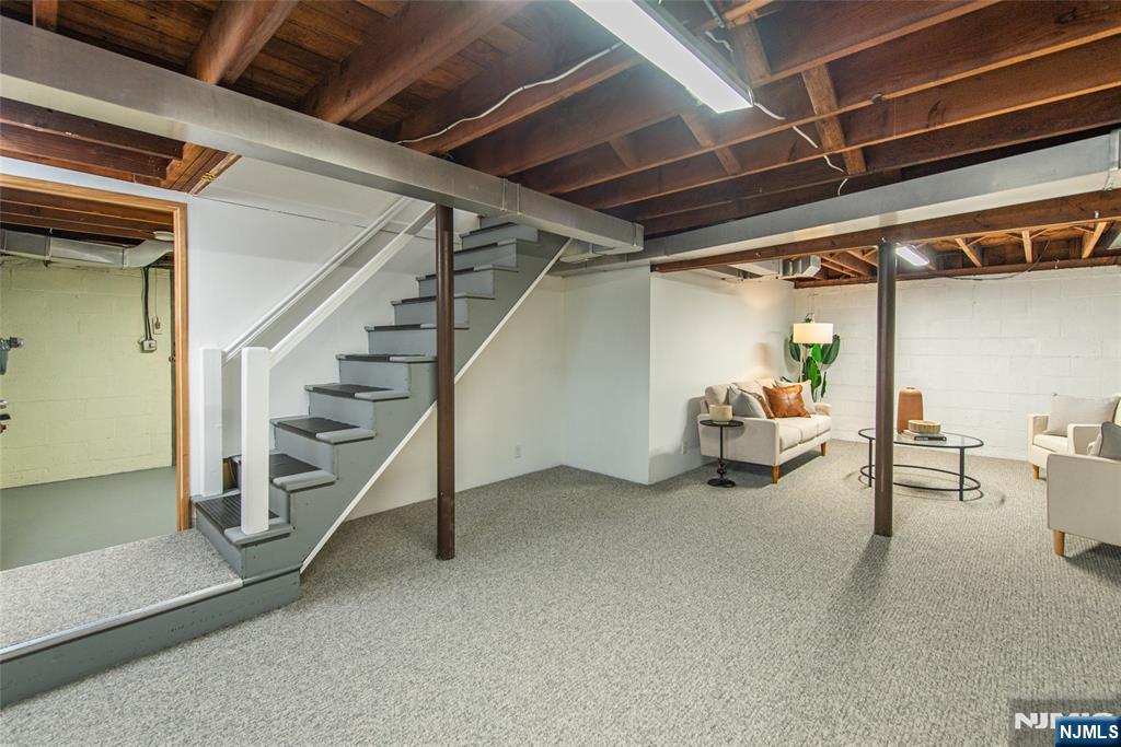 408 Washington Avenue Montclair, NJ 07042 - Photo 33 of 42 a view of livingroom with furniture and stairs