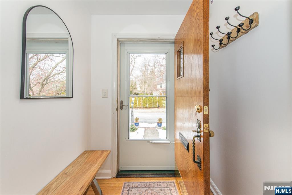 408 Washington Avenue Montclair, NJ 07042 - Photo 4 of 42 a view of a livingroom with wooden floor and a window