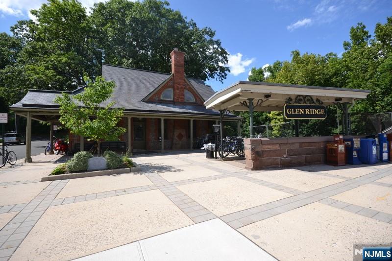 408 Washington Avenue Montclair, NJ 07042 - Photo 42 of 42 a view of a house with sitting area and potted plants