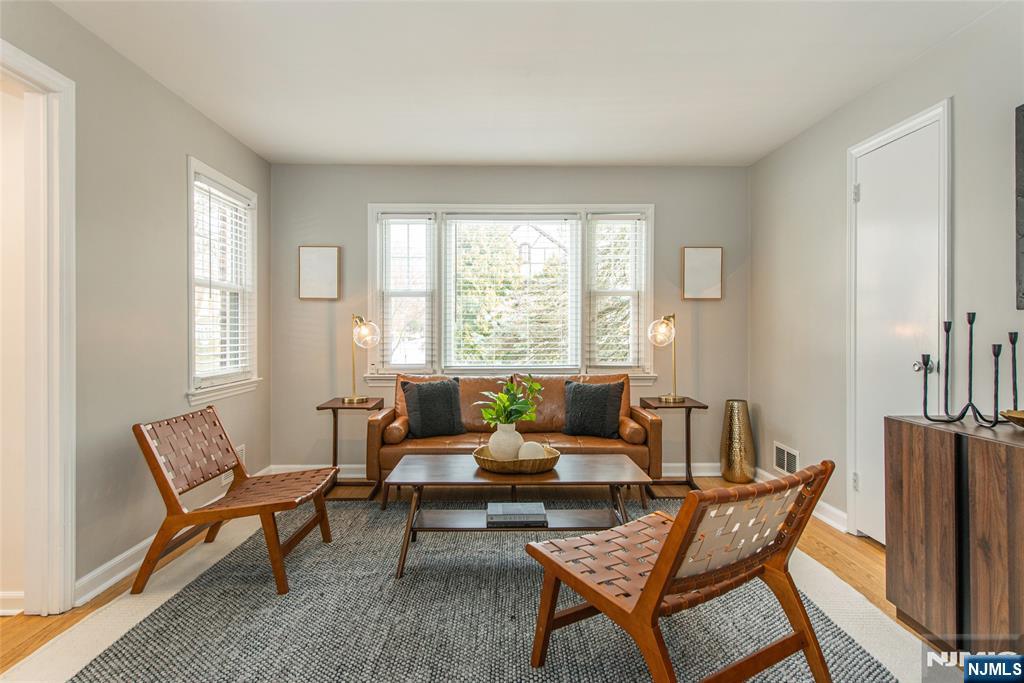 408 Washington Avenue Montclair, NJ 07042 - Photo 7 of 42 a living room with furniture and a large window