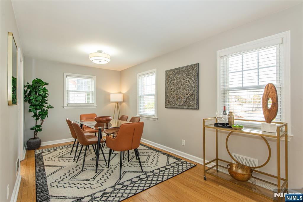 408 Washington Avenue Montclair, NJ 07042 - Photo 10 of 42 a dining room with wooden floor and window