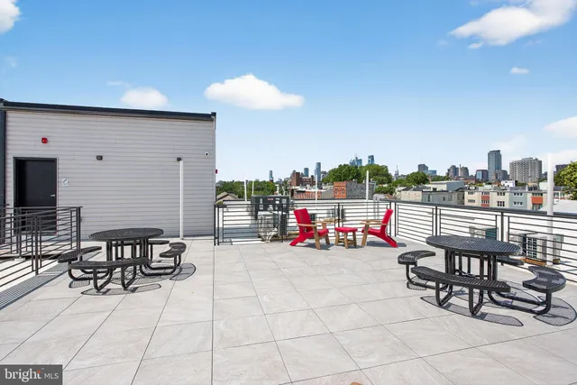 a view of a terrace with sitting area