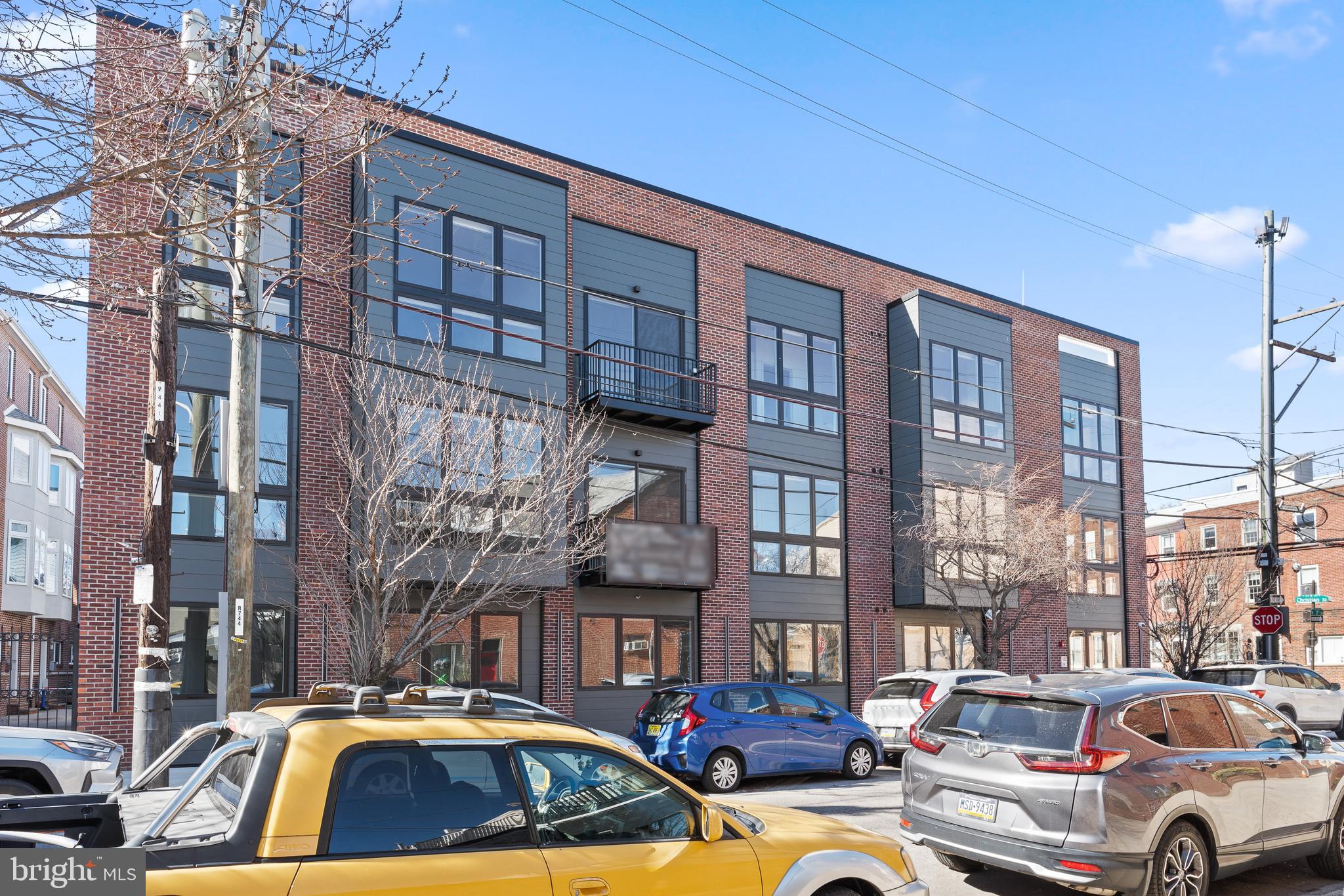 300 Christian Street, Unit 311 Philadelphia, PA 19147 - Photo 30 of 30 a view of parking with cars parked