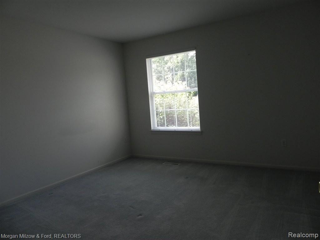 6561 Summit Ridge Court, Unit 44 Clarkston, MI 48346 - Photo 12 of 27 Bedroom 2